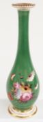 19thC pedestal bud vase hand-decorated with flowers on a green ground, H22cm
