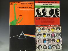 Approximately 30 albums including some jazz, Pink Floyd (D.S.O.T.M.) and Rolling Stones