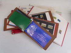 Two Stamford albums of GB stamps and two stockbooks of Channel Islands and Isle of Man stamps