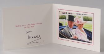 HRH Prince Charles and Camilla photographic Christmas card depicting them in a carriage, signed /