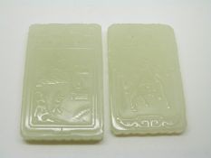 Two Chinese plaques carved with village and horseman scenes, with script verso, length 5cm
