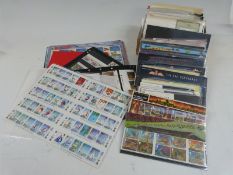 A wide selection of GB QEII mint stamps comprising smiler sheets, presentation packs, traffic