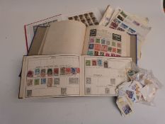 A stockbook of mint GB stamps comprising blocks and sheets and two all-world albums, loose stamps