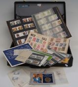 A stockbook of GB gutter pair stamps, a Royal Mail album and sundry presentation packs