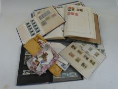 A Liberty stamp album, two small stockbooks, an album of GB first day covers and sundry loose