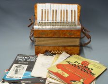 Mastertone German 12 bass piano accordion c1930's, in tangerine pearloid finish, in original carry