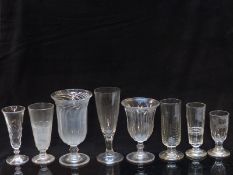 Eight 19thC and later clear glass vases or large goblets, some with cut decoration and one of