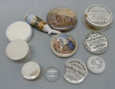 A collection of pot lids including Prattware, advertising, Old Jack, German pipe etc