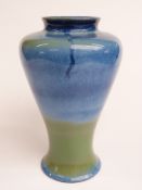 A Cobridge pedestal vase with blue and green decoration, H29cm