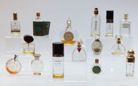 Fifteen glass perfume/scent bottles including Gucci, Dior, Guerlain, Chanel etc, largest 16.5cm tall