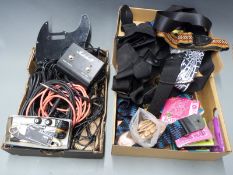 A collection of guitar accessories to include leads, strings, Sony headphones DR.15, shoulder straps