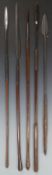 Five 19thC African short thrusting or throwing spears, some with leather binding and worked handles,
