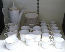 Spode coffee and tea ware in the Golden Eternity pattern, approximately 50 pieces