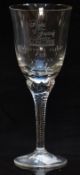 A clear glass wine glass with bowl engraved Flights of Fantasy Goodwood Concorde Christmas Flight To