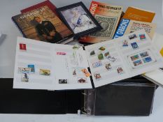 A box of catalogues including 2017 Stanley Gibbons Commonwealth and Empire, reference books, first