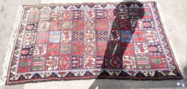 Handmade wool rug with alternating coloured squares, 280x156cm