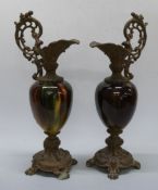 Pair of ceramic dummy ewers/ candlesticks with tiger's eye effect and metal mounts, H36cm