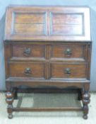 Oak bureau with fall flap above two drawers, W74 x D39 x H99cm