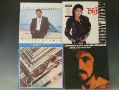 Fifteen albums including Michael Jackson, Bruce Springsteen, The Beatles etc and 35 x 12 inch