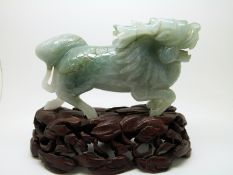 Jadeite style Dog of Fo on hardwood stand