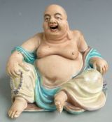 A late 19th/20thC Chinese laughing Buddha, H 14cm