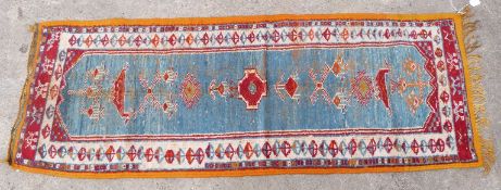 Blue and red ground handmade wool runner or rug, 185x66cm