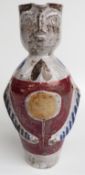A retro studio pottery figural jug or ewer with leaf signature, H31cm