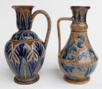 Two Doulton Lambeth ewers, one with hallmarked silver mount signed by Arthur Barlow, the other by