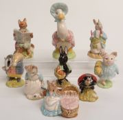 Nine Royal Albert Beatrix Potter figures including large Jemima, Little Black Rabbit and Peter Ate a