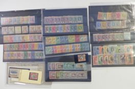 A wide selection of Commonwealth mint stamps on stockcards. Victoria - George V with many complete