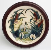 Moorcroft Lamia pattern circular plaque in hardwood frame, diameter 25cm