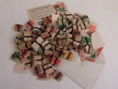 A quantity of small bundles of stamps mainly GB George V and VI, some loose stamps and Silver