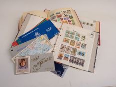 Three albums of all-world stamps and sundry Channel Island booklets