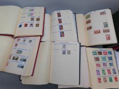 Twelve albums of stamps, Austria x3, Argentina x2, Albania, Algeria, Australia x5, all periods