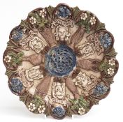 19thC Castle Hedingham mask plate / charger, signed E Bingham to base, D14.5cm