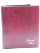 Postcard album containing approximately 50 WWI silk postcards