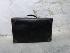 Metal travelling trunk and a vintage suitcase