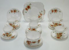 Shelley part tea set, hand decorated with poppies and signed GHA, includes five trios, 20 pieces