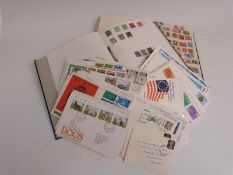 Two albums of GB and foreign stamps, all periods and a quantity of first day covers