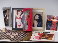 Two Kylie Minogue dolls 1986, Desperately Seeking Susan calendar, Madonna tour programmes, framed