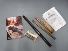 A 19th century rosewood fife stamped 