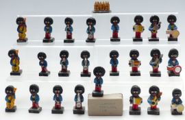 Approximately twenty five Robertsons Jam style Golly band figures