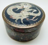 A 19thC Japanese cloisonné lidded pot with dragon decoration, 9cm diameter, 4cm tall