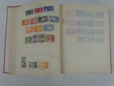 A Stanley Gibbons George VI stamp album of mainly mint stamps