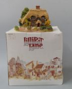Four Lilliput Lane models in boxes