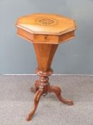 19th century inlaid octagonal mahogany work table with fitted sectional interior raised on a