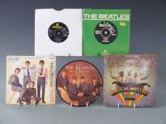 Approximately 50 singles mostly 1960s including The Beatles MMT and EPs, in a case