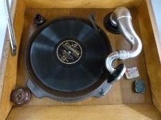 Vintage Garrard electric 78rpm record player, in oak case with carved grille