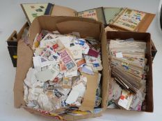 A very large quantity of all-world stamps in two boxes. Loose and in albums, stockbooks etc
