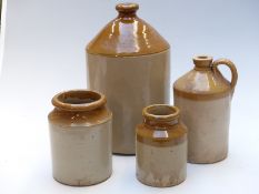 Two stoneware flagons and two jars, tallest 39cm, one impressed G.Hawley, Bristol